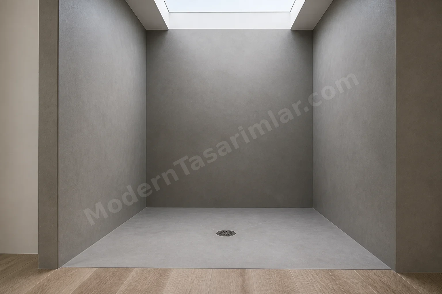 Gri mikrocement kaplama, eşiksiz duş geçişi ve üstten gün ışığı.
